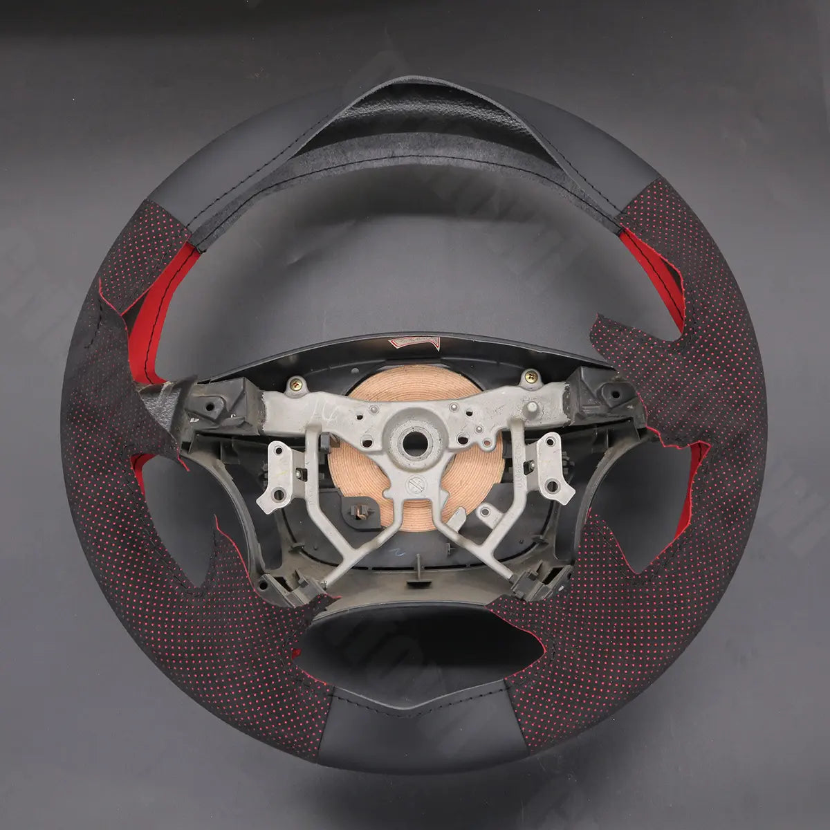 Griffowl Steering Wheel Cover for DIY Pickup Toyota Tundra 2003-2006. DIY kit includes hand-sewn wrap for luxury interior mods.