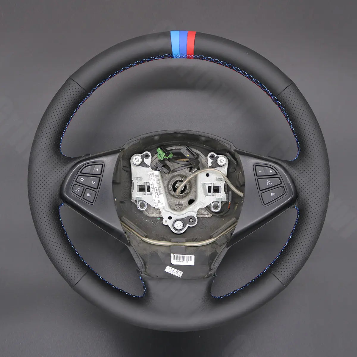 Griffowl Steering Wheel Cover for Personalized SUV BMW X3 E83 2005-2010. Perfect grip with our steering wheel wrap and custom interior touch.