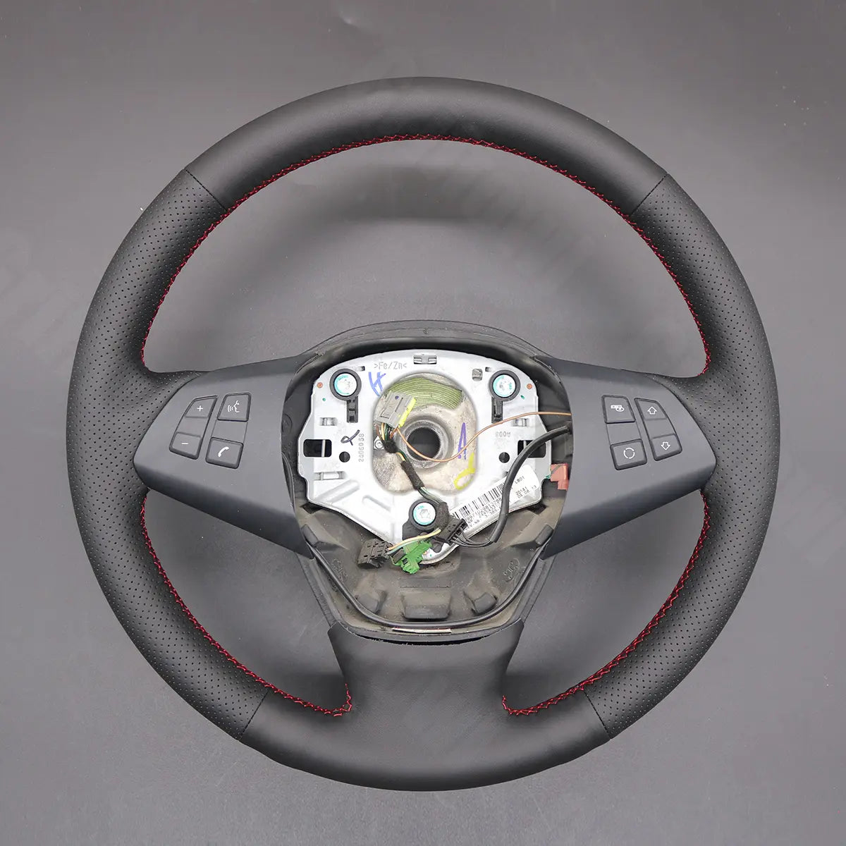 Griffowl Steering Wheel Cover for Personalized SUV BMW X5 E70 2006-2013. Perfect grip with our steering wheel wrap and custom interior touch.