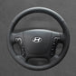 Griffowl Steering Wheel Cover for Personalized SUV Hyundai Santa Fe 2007-2012. Griffowl's interior mod with hand-sewn DIY steering wheel kit.
