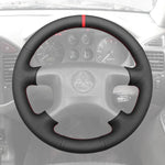 Griffowl Steering Wheel Cover for Personalized SUV Mitsubishi Pajero Montero Shogun 2000-2006. Elevate your interior with Griffowl's wrap and stitch kit.
