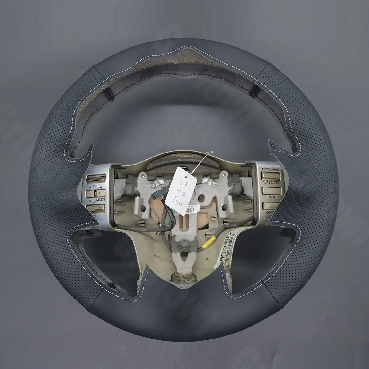 Griffowl Steering Wheel Cover for Personalized SUV Nissan Armada 2004-2012. Perfect grip with our steering wheel wrap and custom interior touch.
