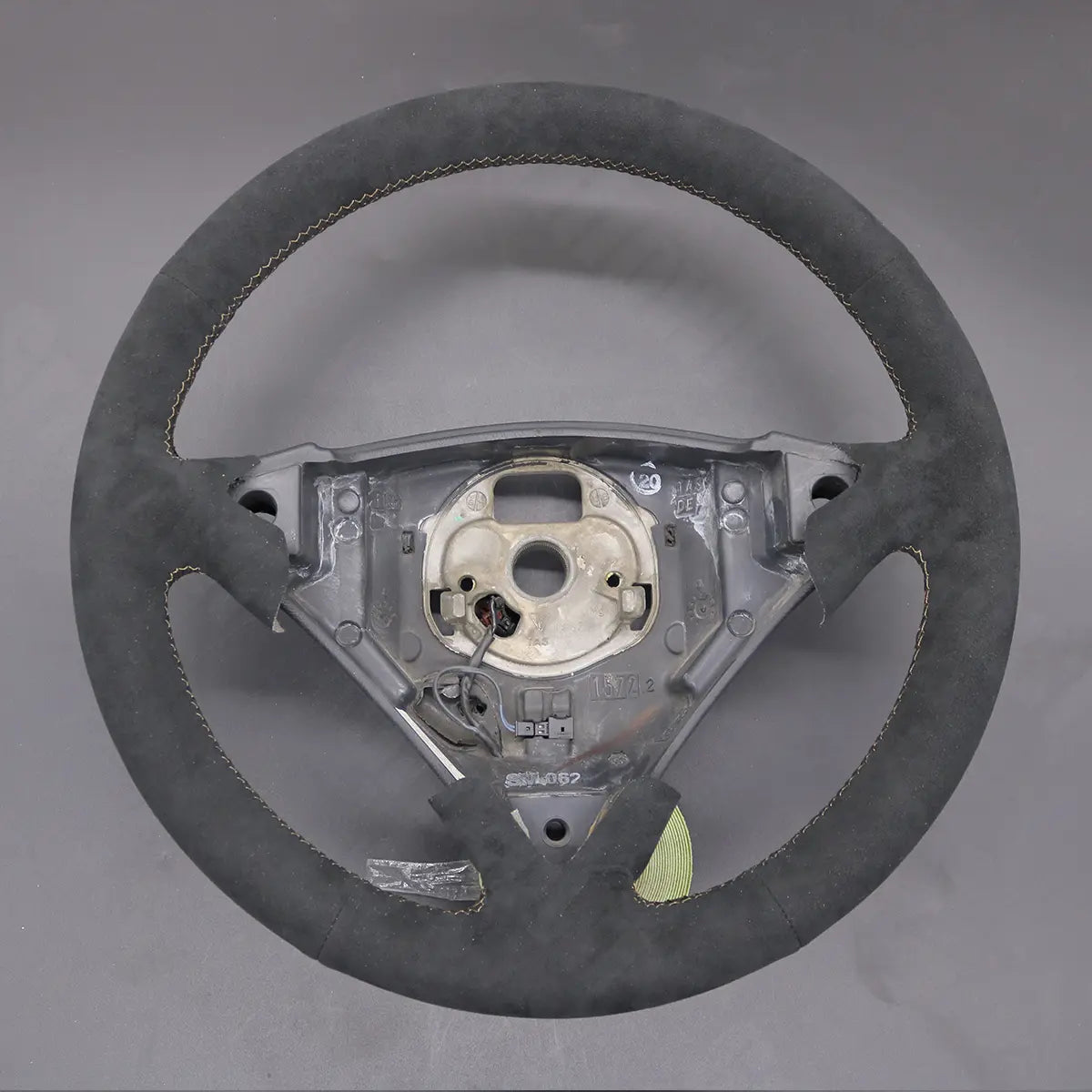 Griffowl Steering Wheel Cover for Personalized SUV Porsche Cayenne 2003-2010. Griffowl's interior mod with hand-sewn DIY steering wheel kit.