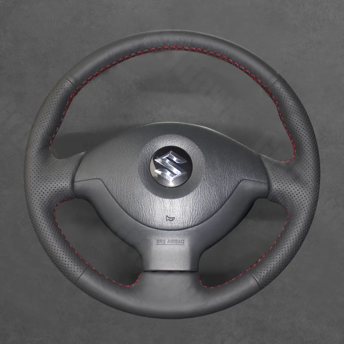 Griffowl Steering Wheel Cover for Personalized SUV Suzuki Jimny 2005-2014. Perfect grip with our steering wheel wrap and custom interior touch.