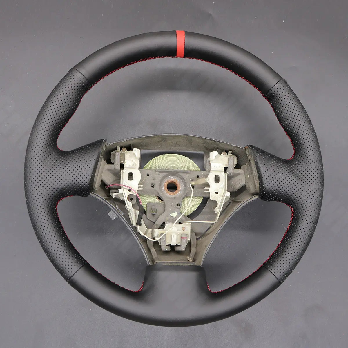 Griffowl Steering Wheel Cover for Personalized Toyota-RX300-Corolla-1999-2000-2001-2002-2003. Elevate your interior with Griffowl's wrap and stitch kit.