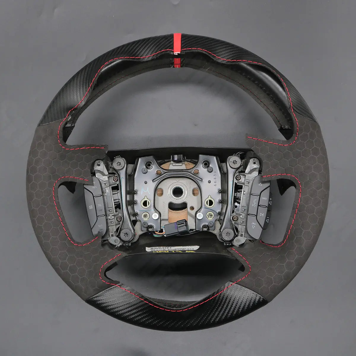 Griffowl Steering Wheel Cover for Tailored Coupe Chevrolet Monte Carlo 2006-2007. For refined interior upgrades using our wrap and stitch kit.
