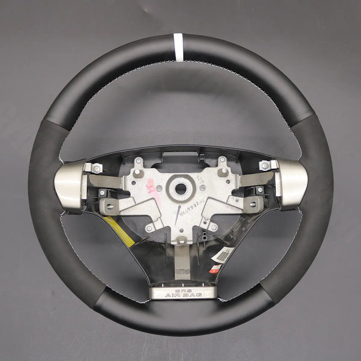 Griffowl Steering Wheel Cover for Tailored Coupe Hyundai Tiburon Coupe S-Coupe 2007-2010. Elevate your interior with Griffowl's wrap and stitch kit.
