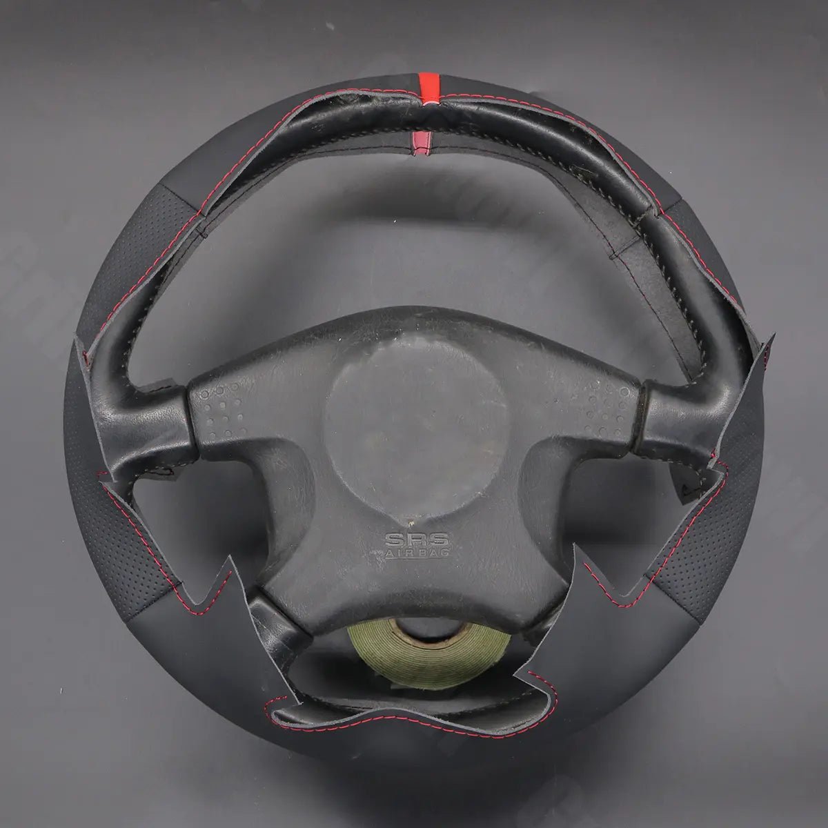 Griffowl Steering Wheel Cover for Tailored Coupe Nissan Skyline ECR33 R33 GTR 1995-1998. Elevate your interior with Griffowl's wrap and stitch kit.

